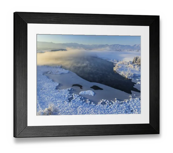 Framed Print : Aerial view of a lake in front of mountains