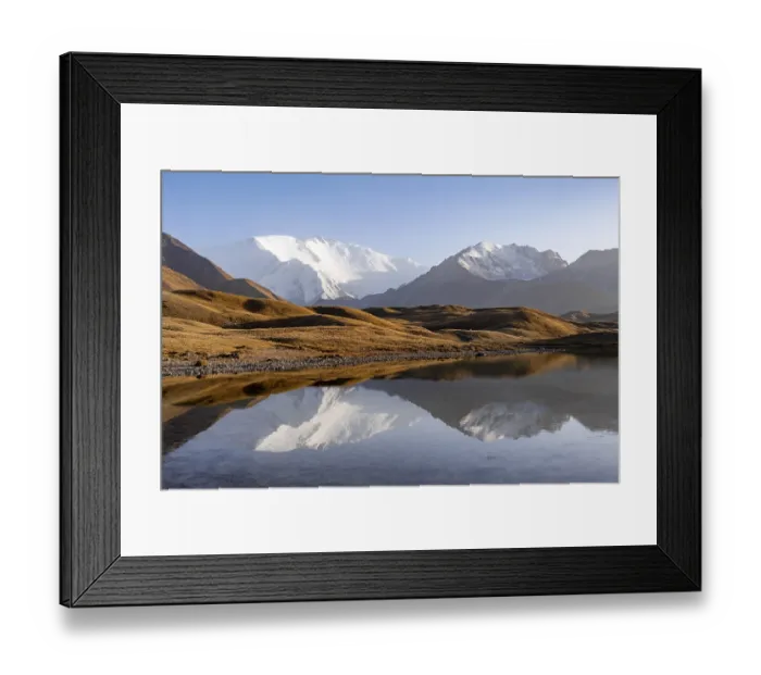 Framed Print : Mountains reflected in a small mountain lake