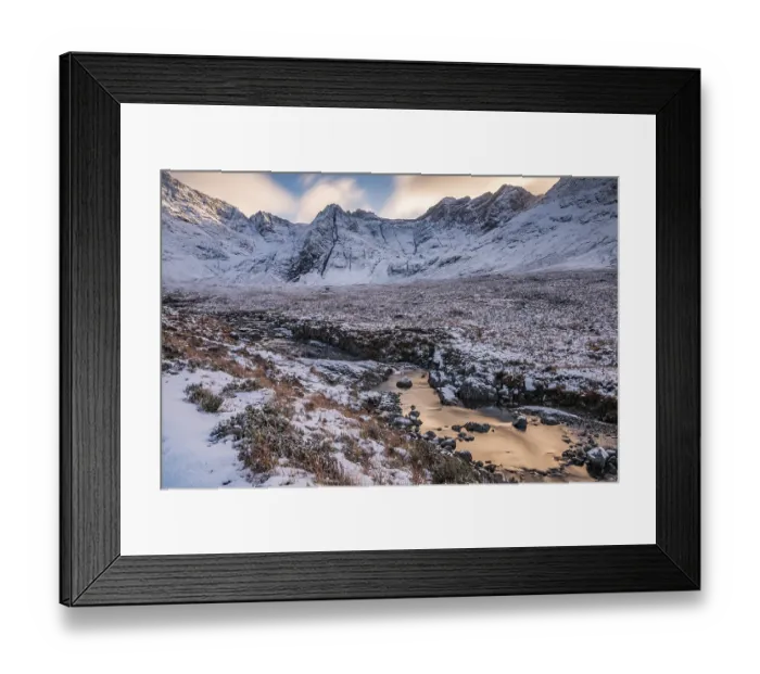 Framed Print : Small river in snowy landscape with winter Cullins mountains in the background