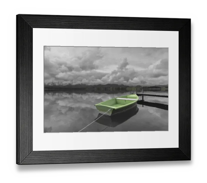 Framed Print : Storm clouds at sunset, a green rowing boat lashed to the wooden jetty