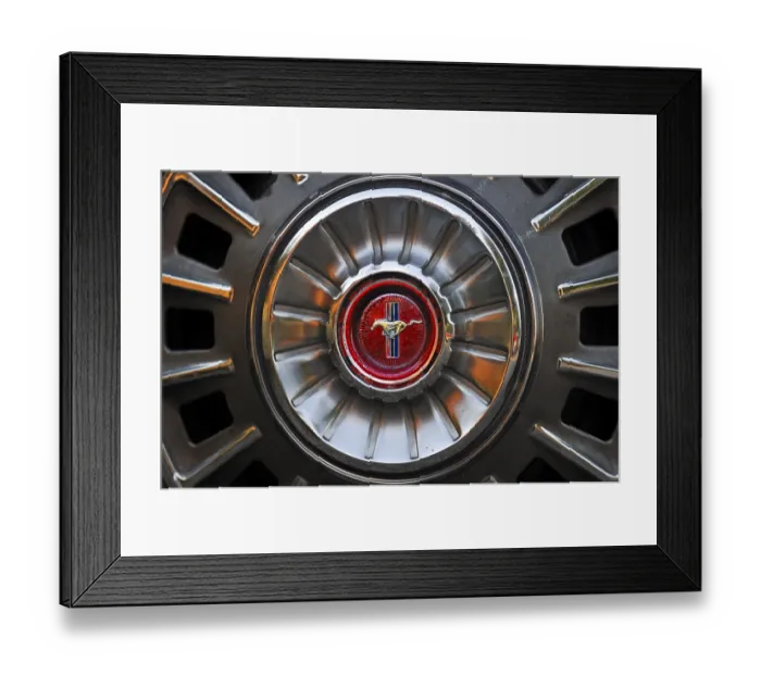Framed Print : Detail of a classic car, wheel rim with emblem of a Ford Mustang Convertible Framed Print : Detail of a classic car, wheel rim with emblem of a Ford Mustang Convertible