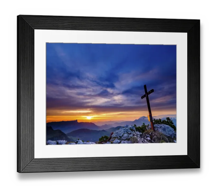 Framed Print : Iceberg summit cross and cloudy atmosphere at sunrise