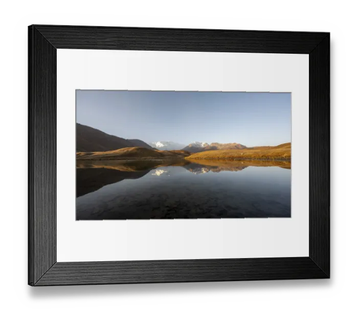 Framed Print : White glaciated and snowy mountain peak Pik Lenin at sunrise
