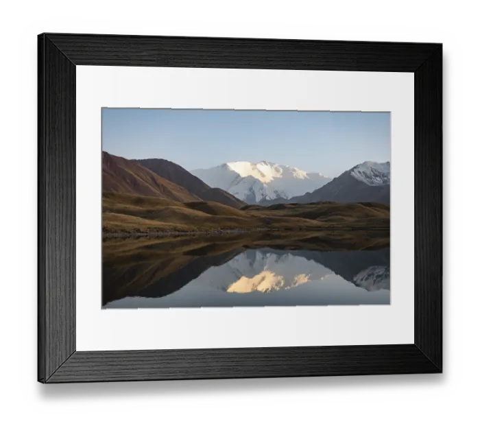 Framed Print : White glaciated and snowy mountain peak Pik Lenin at sunset