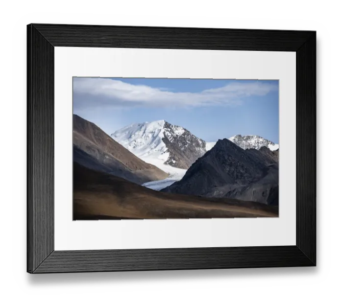 Framed Print : Glaciated and snow-covered peaks