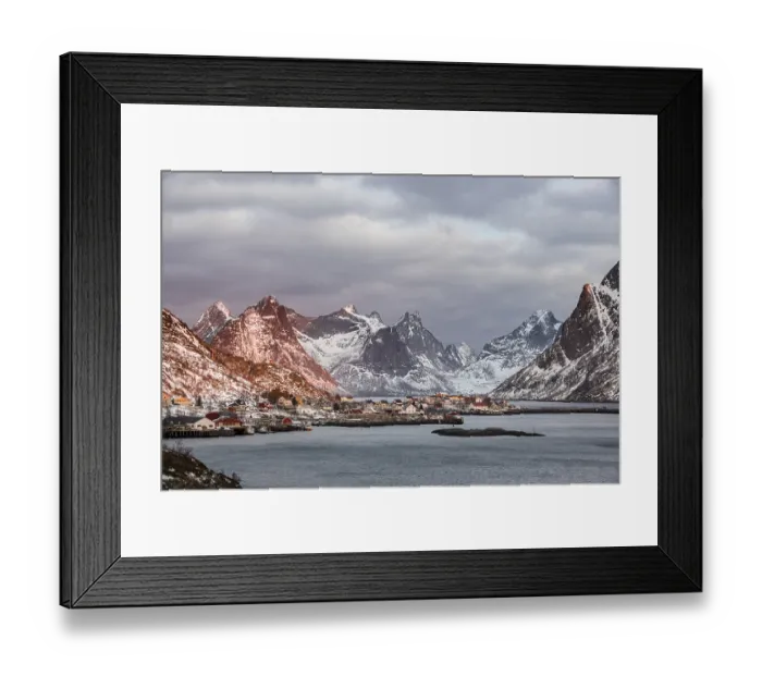 Framed Print : View of the fishing village Reine surrounded by rugged mountains Framed Print : View of the fishing village Reine surrounded by rugged mountains