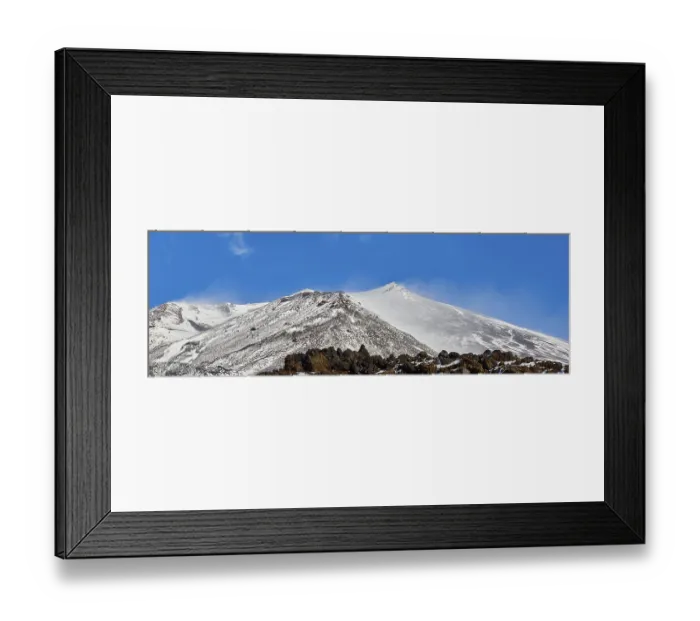Framed Print : Lava scree, snow-capped peaks, blue sky