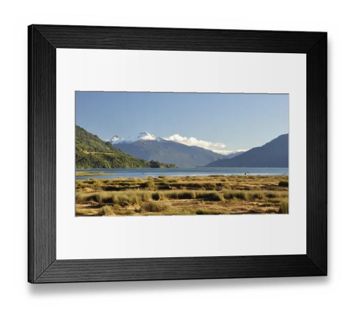 Framed Print : The Estero Reloncavi near Cochamo in southern Chile with the snow-capped volcano Yate
