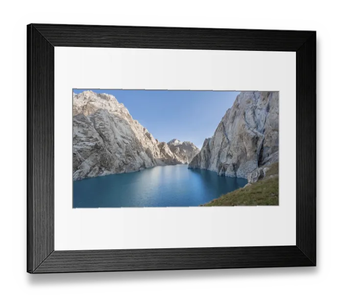 Framed Print : Turquoise mountain lake Kol Suu with rocky steep mountains