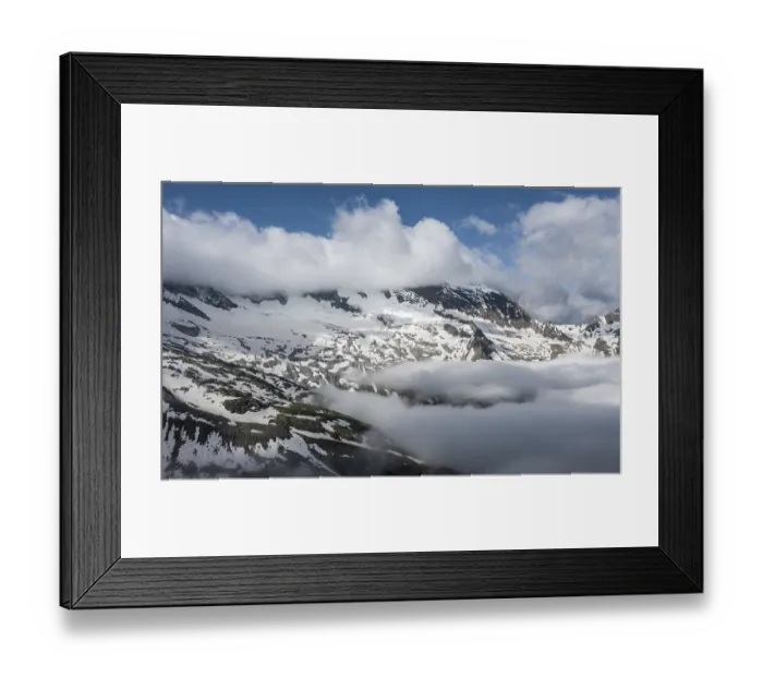 Framed Print : Snow-covered mountains, high alpine landscape with clouds Framed Print : Snow-covered mountains, high alpine landscape with clouds