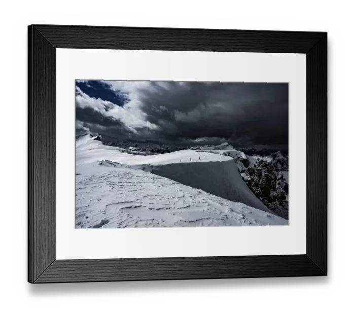 Framed Print : Berlinger Koepfl summit area with snow-covered mountains in the background and dramatic sky Framed Print : Berlinger Koepfl summit area with snow-covered mountains in the background and dramatic sky