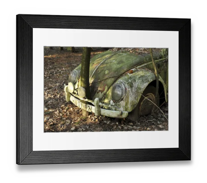 Framed Print : Vintage VW Beetle standing in a forest