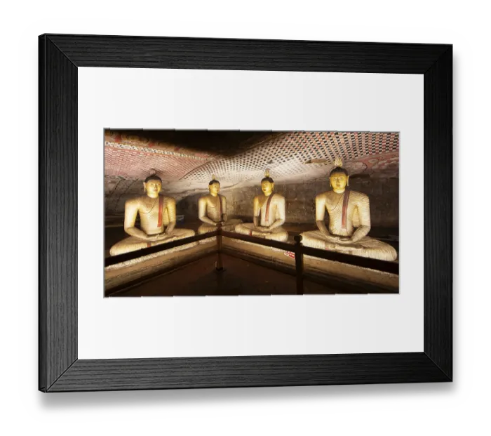 Framed Print : Seated Buddha statues in the Dambulla cave temple