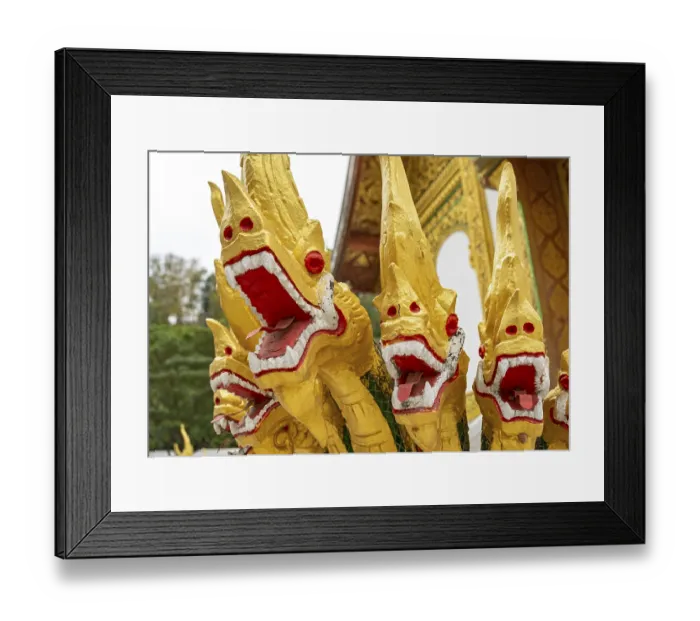Framed Print : Naga at the steps of Wat Ho Pha Bang temple