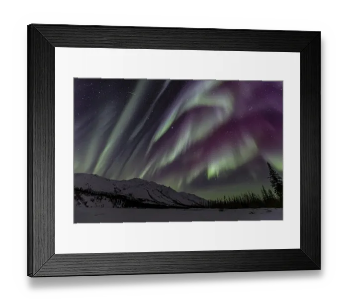 Framed Print : Green, yellow and purple northern lights (aurora borealis) over snowy mountains