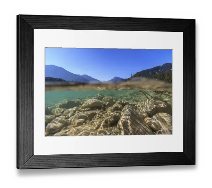 Framed Print : Underwater shot of river in front of mountains