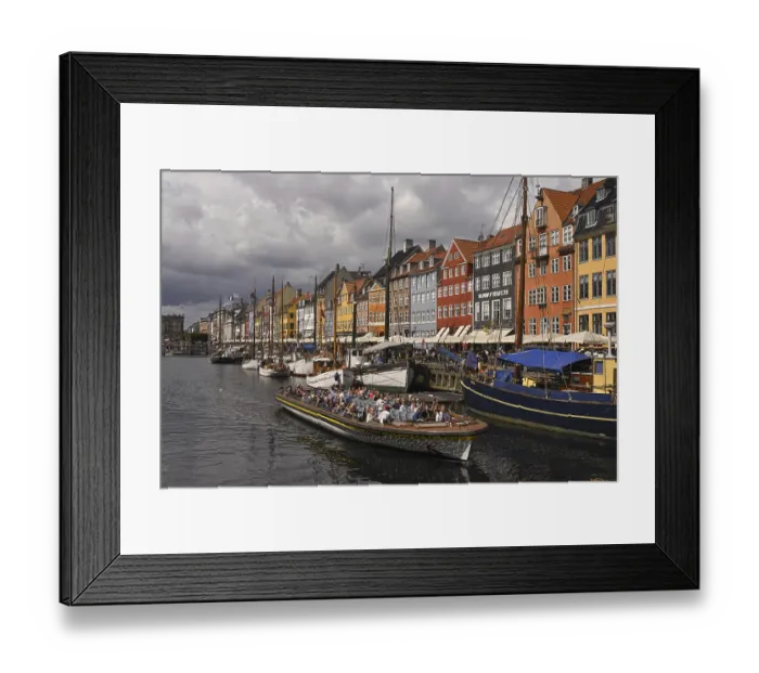 Framed Print : Excursion boat at the busy Nyhavn Canal