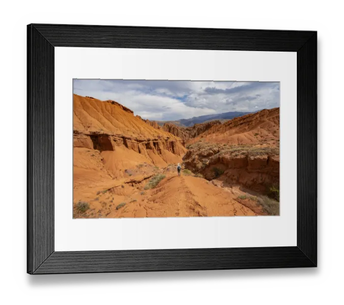 Framed Print : Mountaineer on a mountain ridge