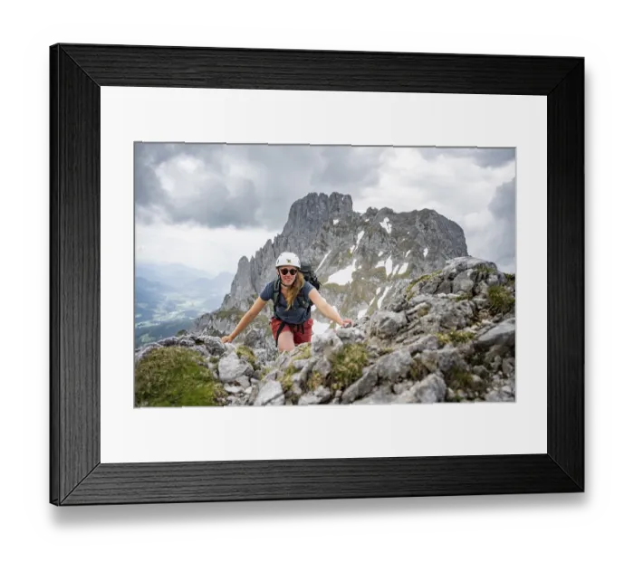 Framed Print : Mountaineer with helmet, ascent to the Ackerlspitze