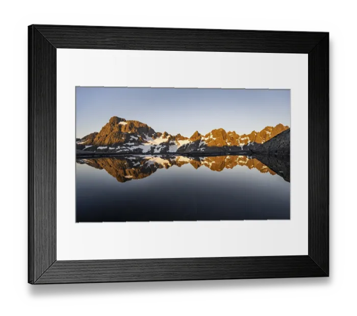 Framed Print : Rocky mountain peaks reflected in a small pond