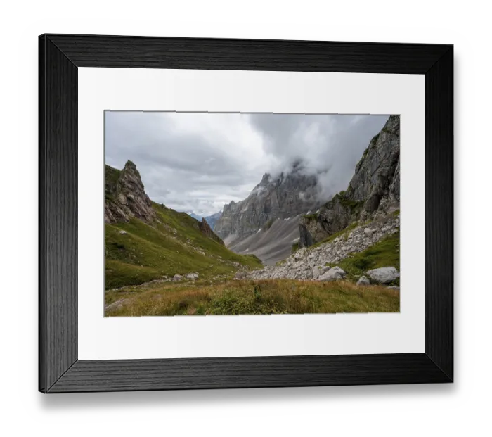 Framed Print : Cloudy mountains, view into a mountain valley Framed Print : Cloudy mountains, view into a mountain valley