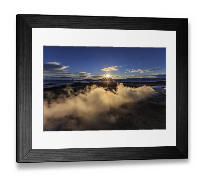 Framed Print : Hot springs and geothermal area in front of mountain landscape in winter
