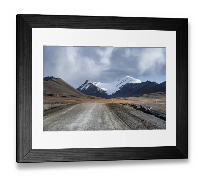 Framed Print : Gravel road through autumnal plateau