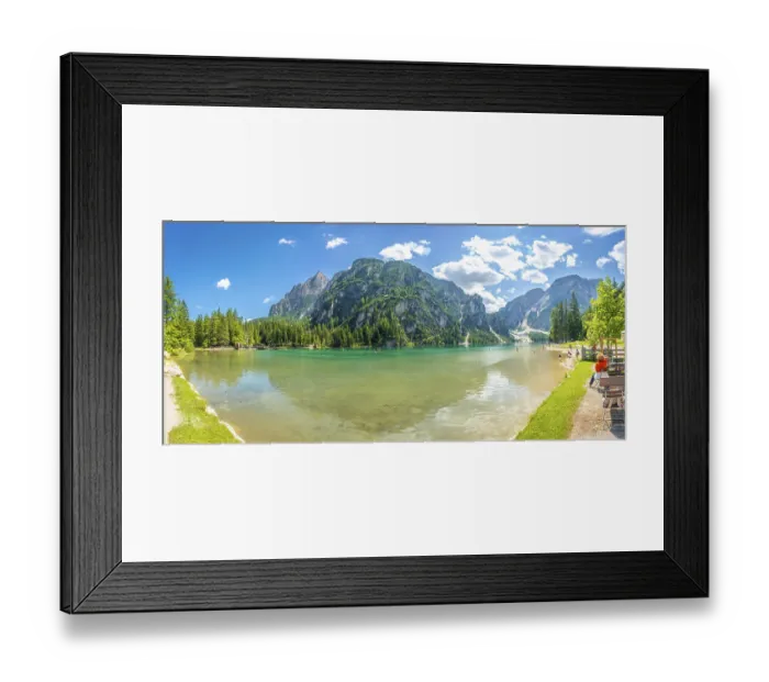 Framed Print : Tourists enjoying the breathtaking panorama of lake braies with its crystal clear turquoise waters reflecting
