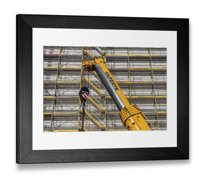 Framed Print : Construction machinery and materials at a building site Framed Print : Construction machinery and materials at a building site