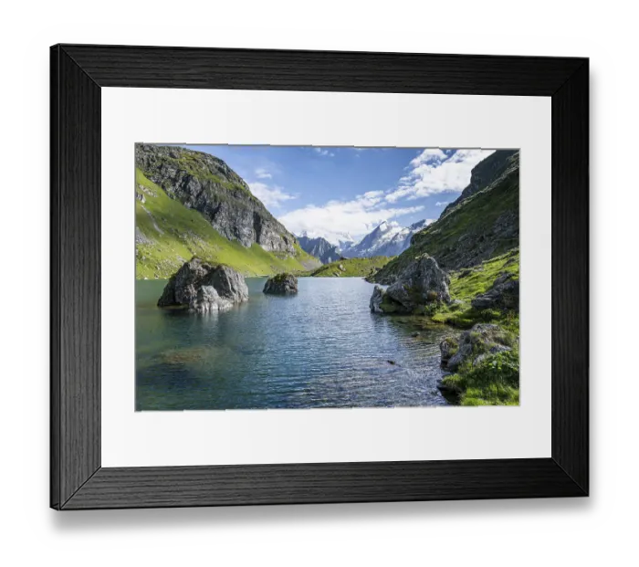 Framed Print : Mountain lake with view of glaciated mountain peaks Framed Print : Mountain lake with view of glaciated mountain peaks