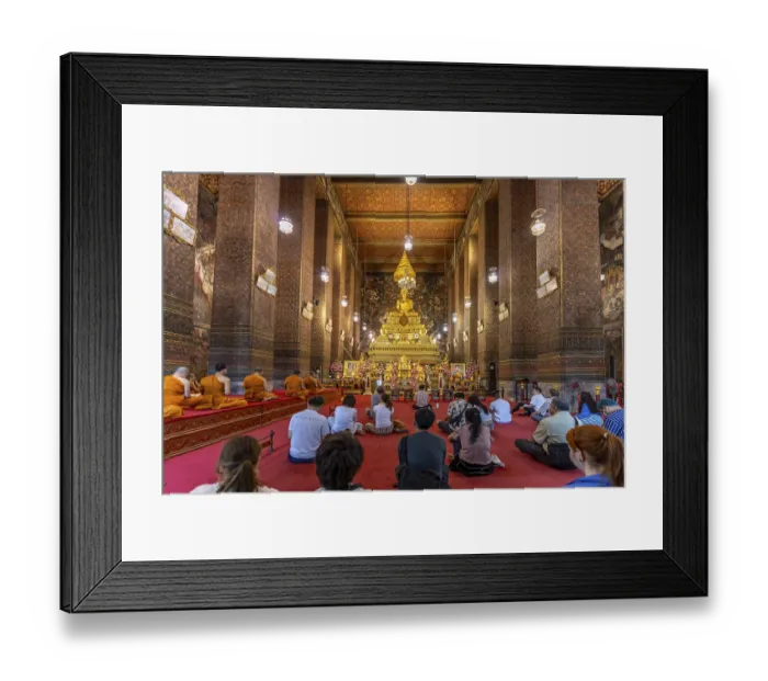 Framed Print : Prayer with monks in the Buddhist Phra Ubosoth