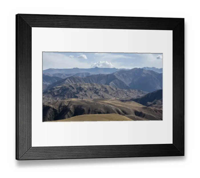 Framed Print : View over eroded mountainous landscape with brown dry hills Framed Print : View over eroded mountainous landscape with brown dry hills