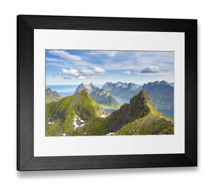 Framed Print : Mountain landscape with steep rocky peaks fjords and sea