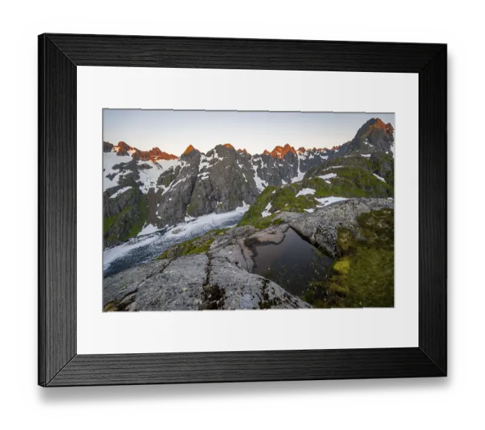Framed Print : Rocky mountain peaks and Trollfjordvatnet with snow