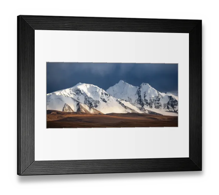 Framed Print : Glaciated and snow-covered mountains