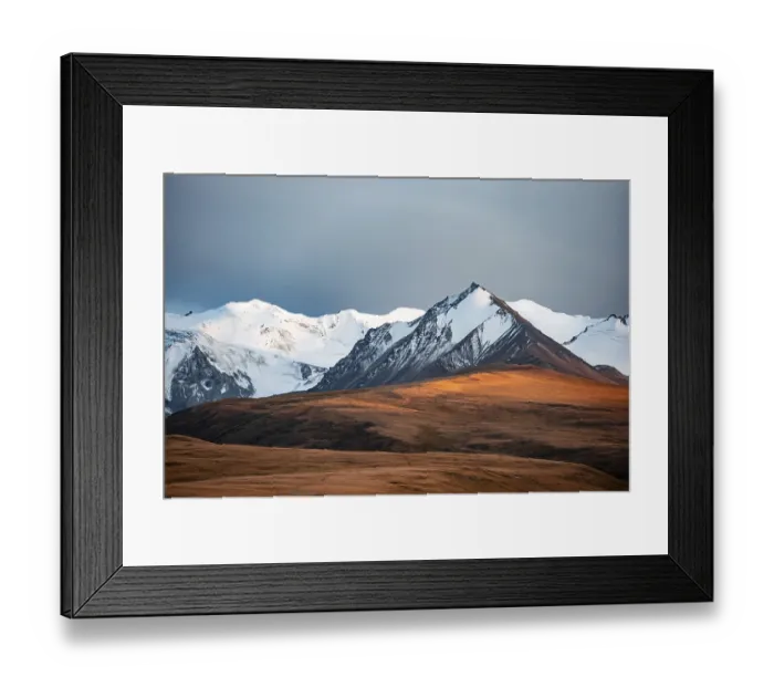 Framed Print : Glaciated and snow-covered mountains