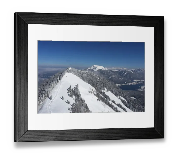 Framed Print : Drone shot, deep snowy winter landscape in the Osterhorn group with view to the Zwoelferhorn and Wolfgangsee Framed Print : Drone shot, deep snowy winter landscape in the Osterhorn group with view to the Zwoelferhorn and Wolfgangsee