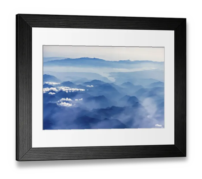 Framed Print : Mountains and clouds, mountain peaks in blue light