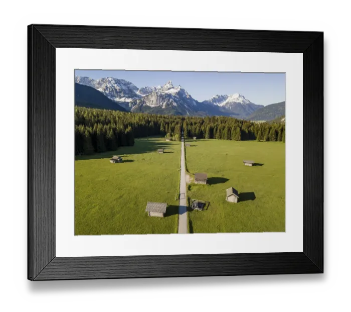 Framed Print : Hay barns in a meadow, Ehrwalder Sonnenspitz and mountains