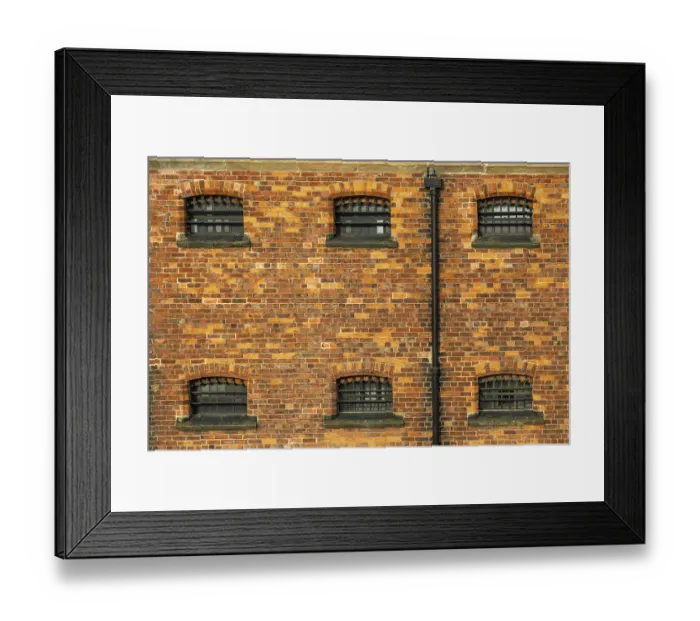 Framed Print : Cell windows with bars, exterior of Victorian jail museum Framed Print : Cell windows with bars, exterior of Victorian jail museum
