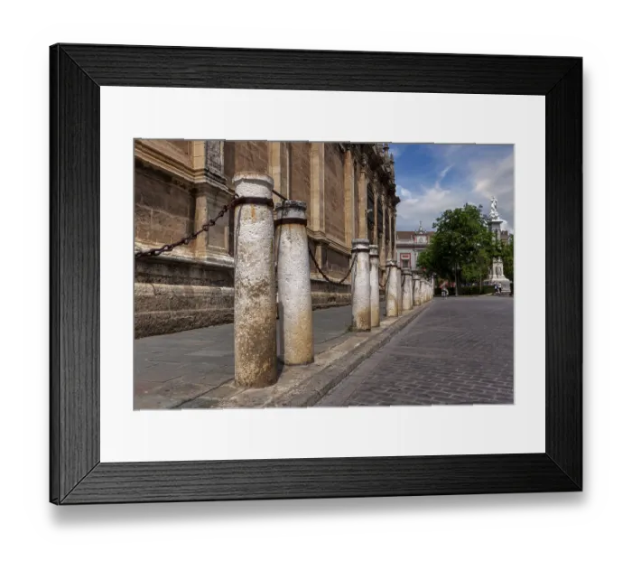Framed Print : Bollards on the pavement, architecture in the old town