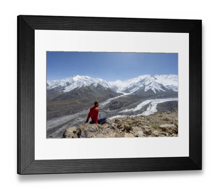Framed Print : Mountaineer at Traveller's Pass with view of impressive mountain landscape