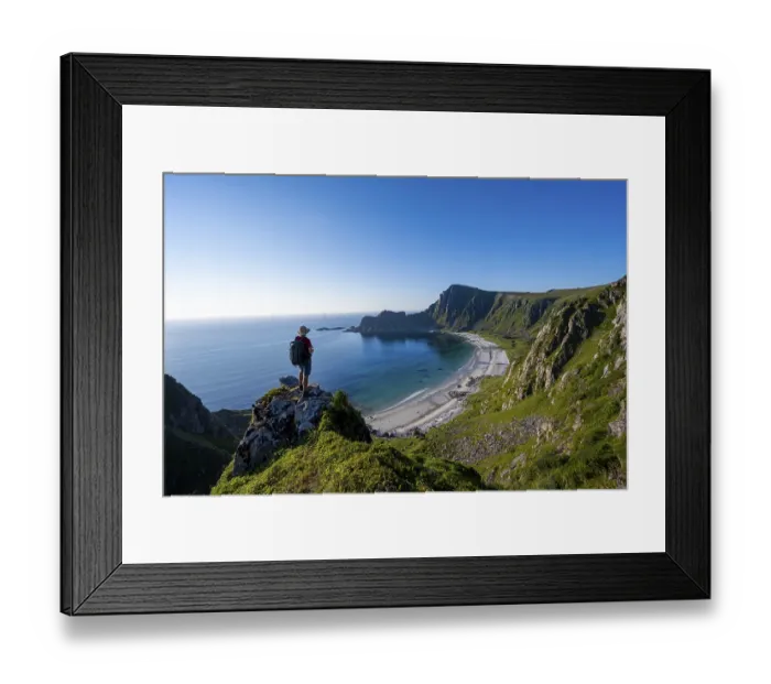 Framed Print : Mountaineer with view of coastal landscape