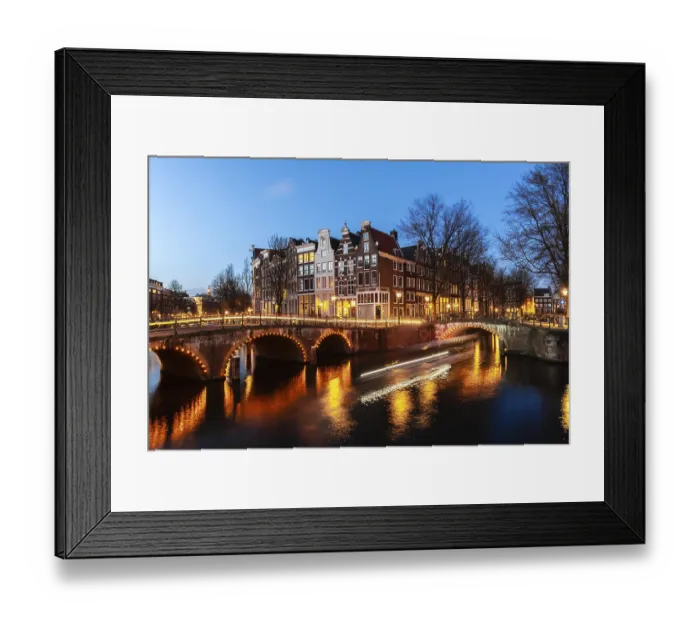 Framed Print : Evening mood, light tracks, boat cruises through canal with bridge Framed Print : Evening mood, light tracks, boat cruises through canal with bridge