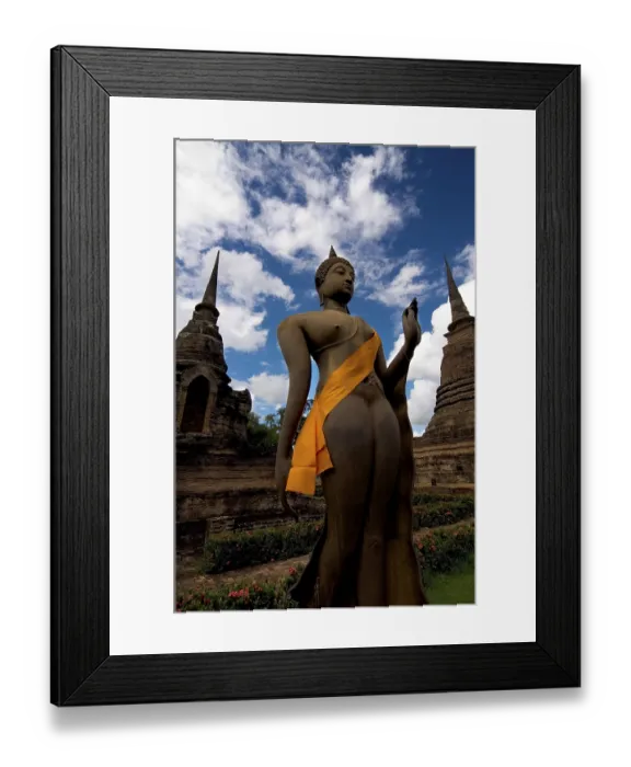 Framed Print : Buddha statue in front of a temple Framed Print : Buddha statue in front of a temple