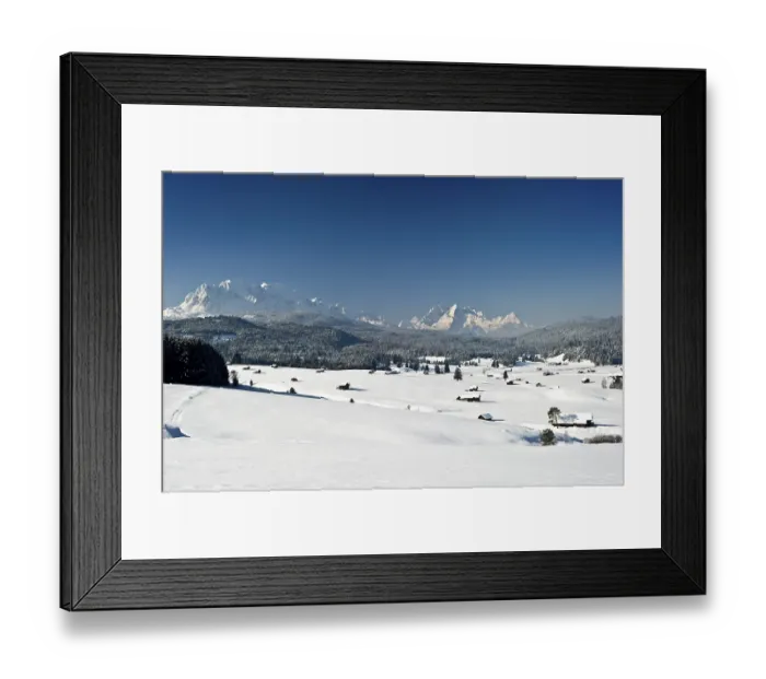 Framed Print : Snow-covered pastures and hay barns