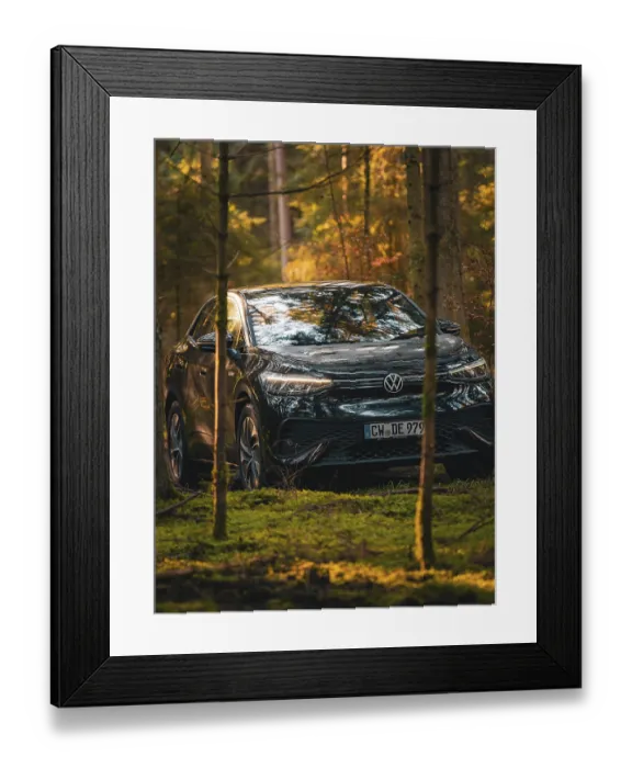 Framed Print : Car between trees in the forest with sunbeams on the bonnet Framed Print : Car between trees in the forest with sunbeams on the bonnet