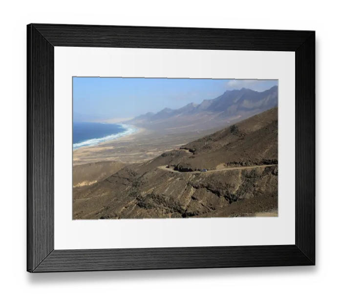 Framed Print : Car driving on unsurfaced road