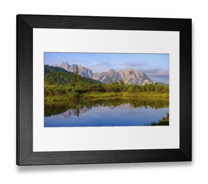 Framed Print : Panorama photo, the peaks of the Gosaukamm are reflected in the moor lake at Loeckermoos