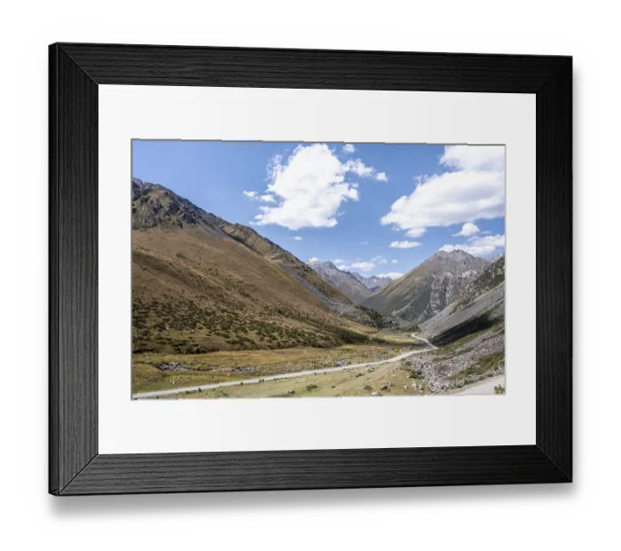 Framed Print : Gravel road in the mountains of the Tien Shan